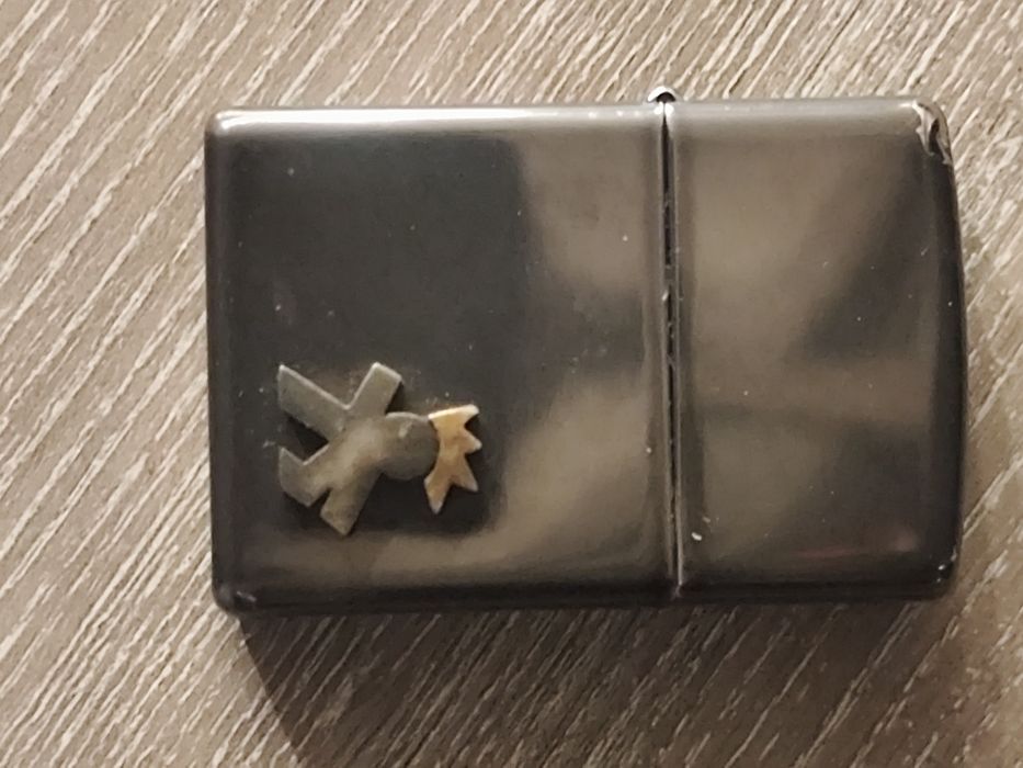 Bricheta și husa Zippo