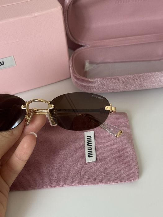 Овални очила MiuMiu