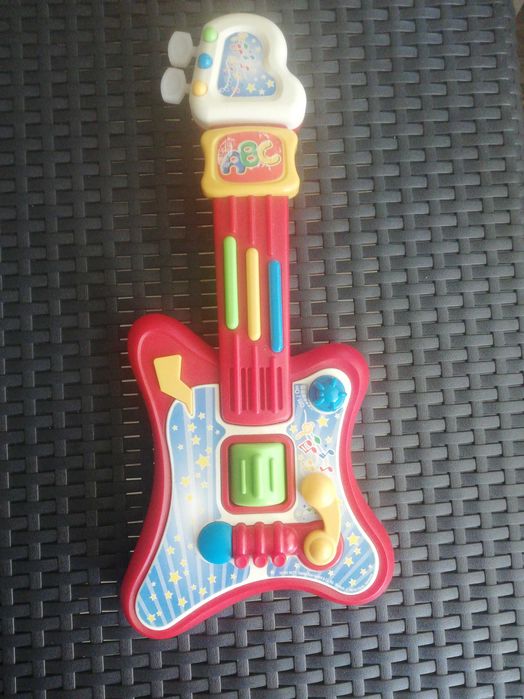 Vând chitara jucarie