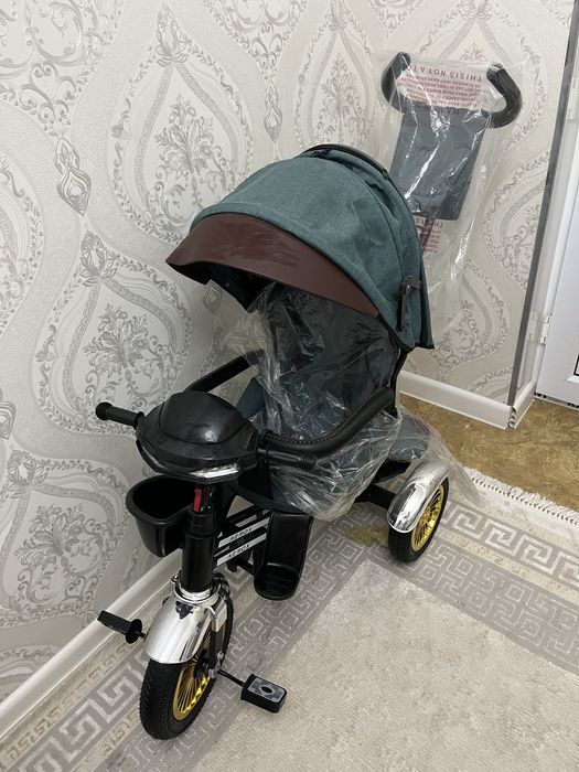 детский трехколёсный велосипед-коляску