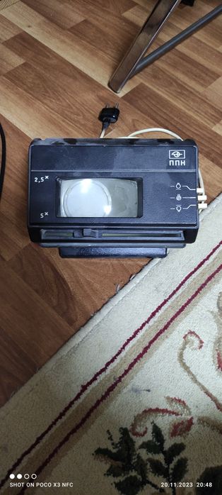 Аппарат дл проверки подлинности долларов.