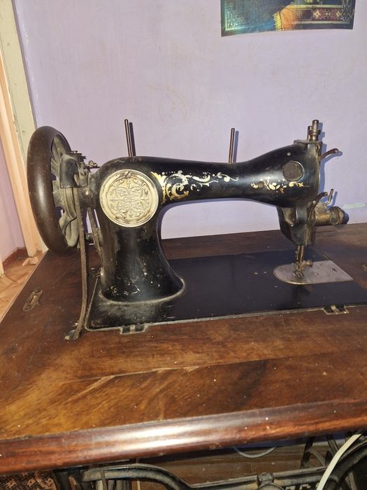 Mașină de cusut singer