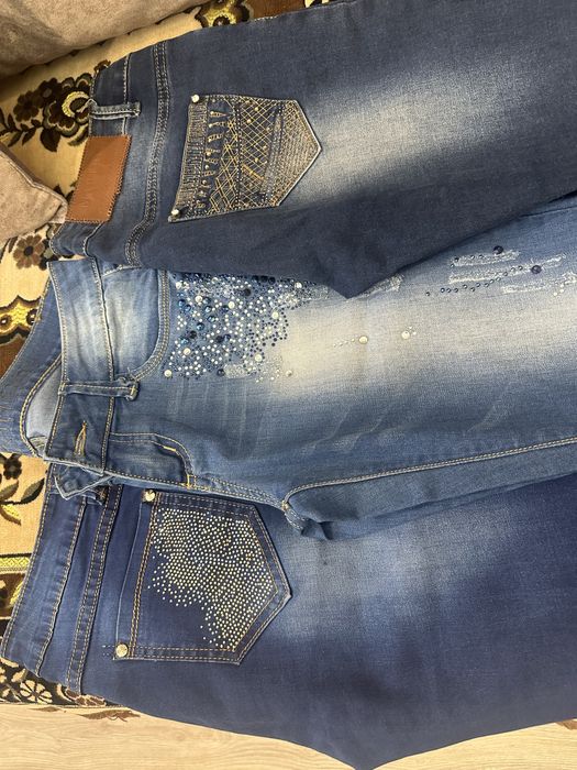 Джинсы женские