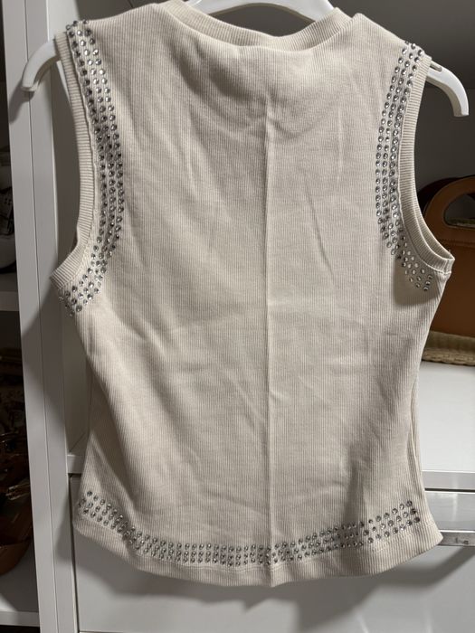 Потник с камъни и паднало рамо