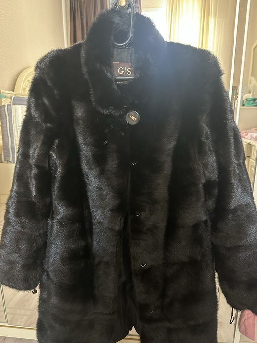 Шуба черного цвета за 100 тыс