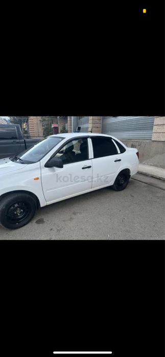 Машина Лада Гранта.Газ-бензин