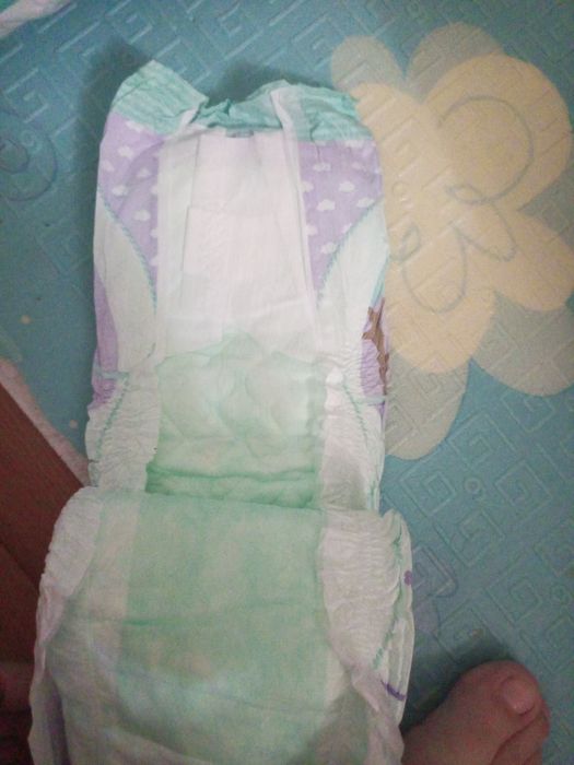 Продам подгузники 6