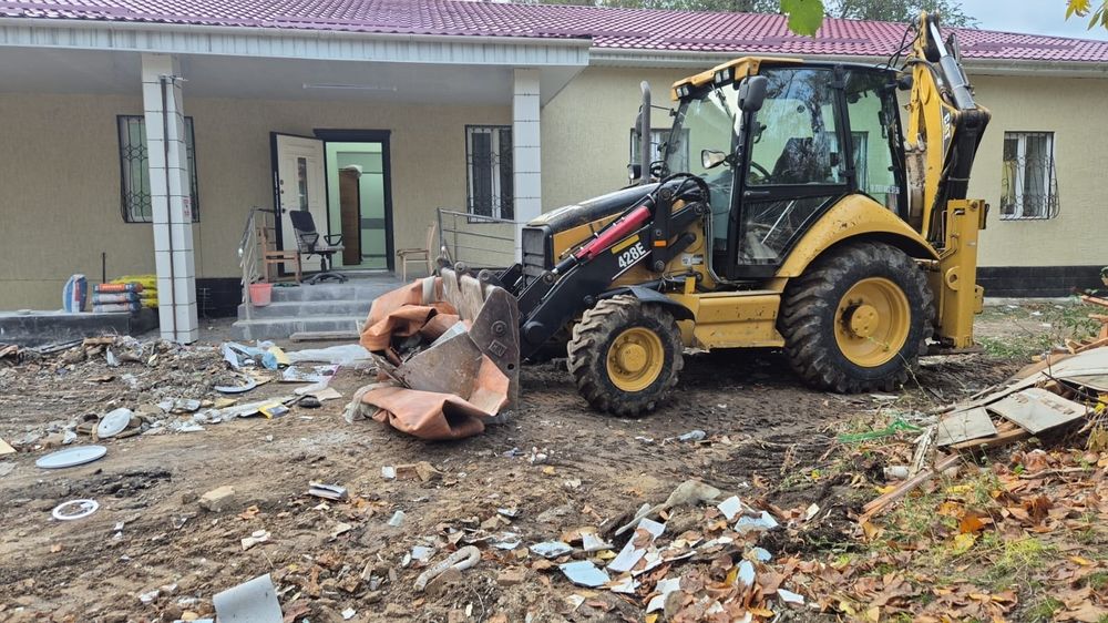 Услуги экскаватора 3 в 1 CAT