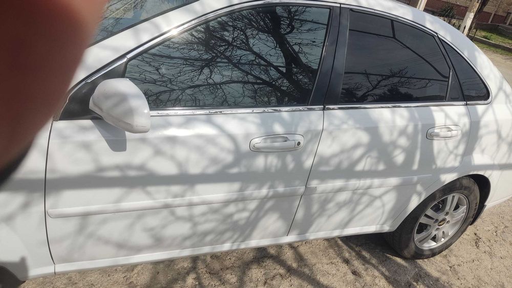 Chevrolet Lacetti / Gentra 2010 — 2