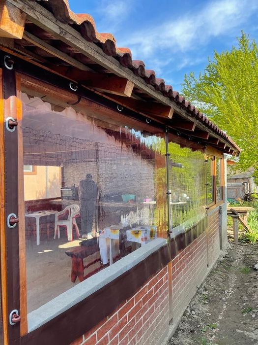 Închideri terase,folie transparentă capse și bride,rulouri cu manivelă