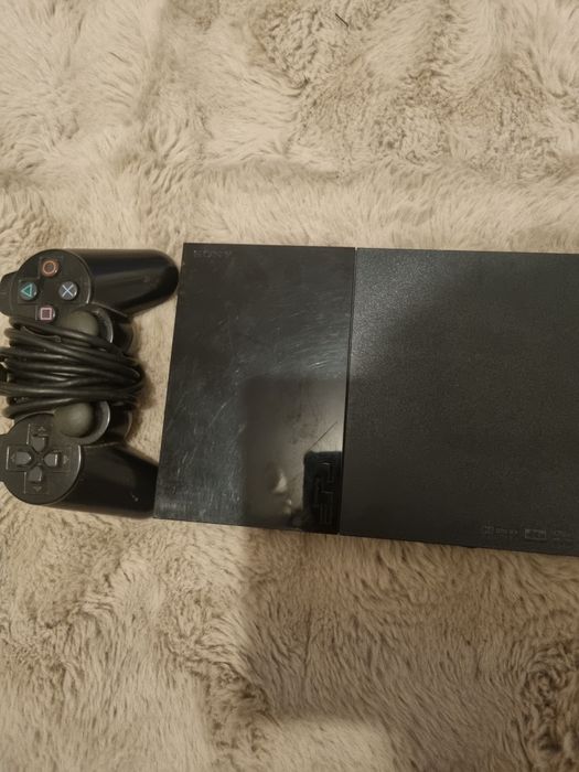 Playstation 2 cu 9 jocuri si controller