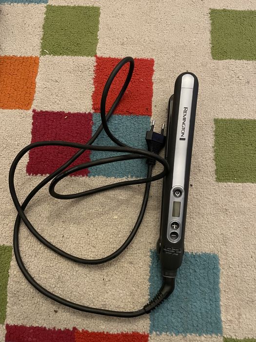 Placa de ondulat si indreptat parul Remington