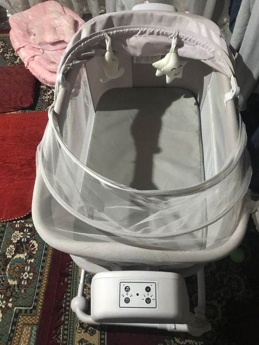 Iyulka, elektronning beshik,bolalar manej krovat.