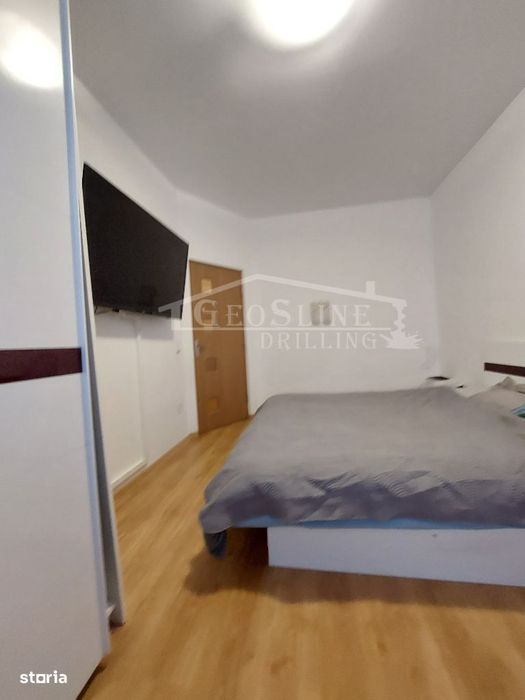 Apartament 2 dormitoare 1 Open-space Parcare privată extra