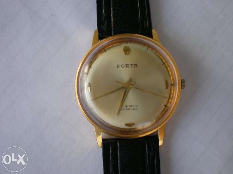 Порта перфектен часовник с позлата