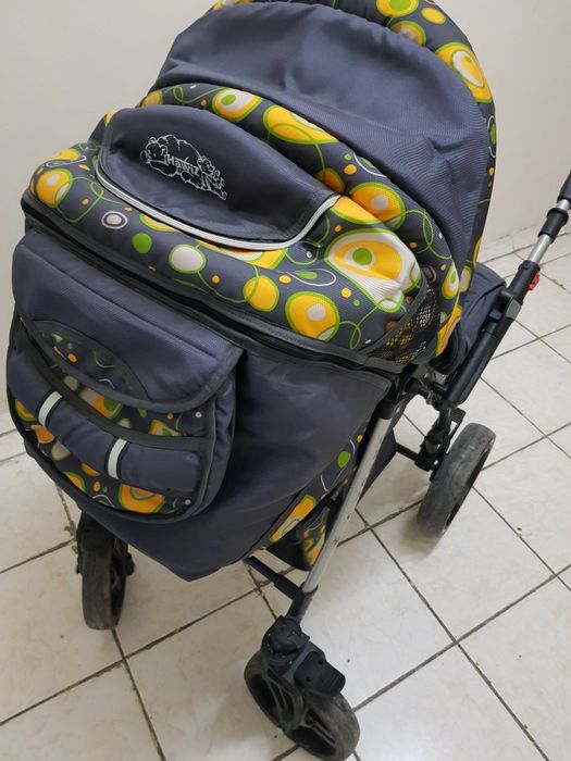 Продам утепленную коляску