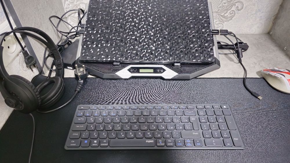 Ultra yupqa Rapoo E9350G simsiz klaviatura — minimalist dizayn.