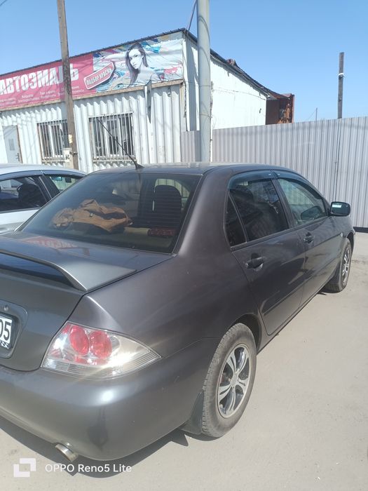 Авто Митцубиси Ланцер 2011г.