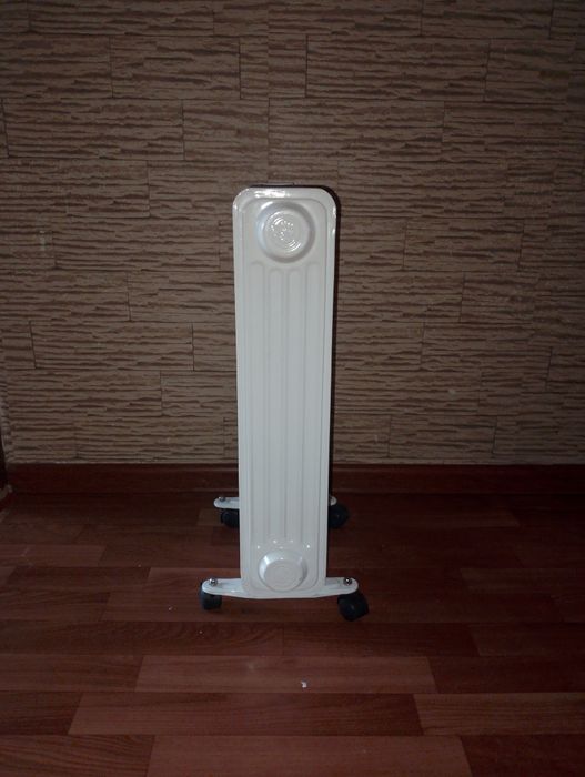 Масляный обогреватель новый