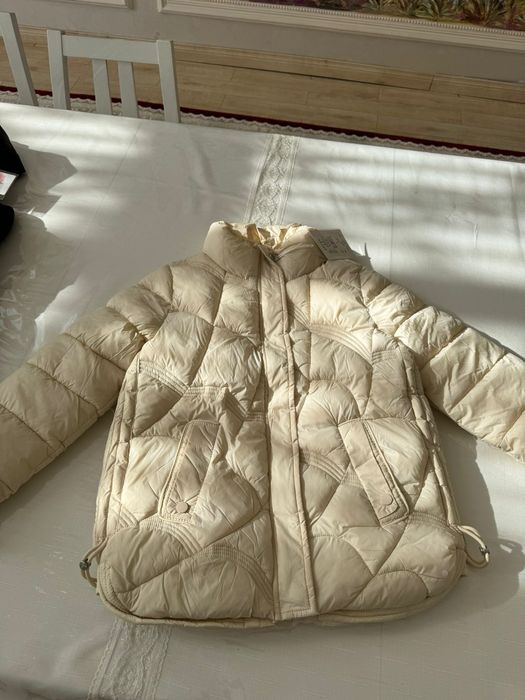 Куртка жаңа этикеткасы алынбаған