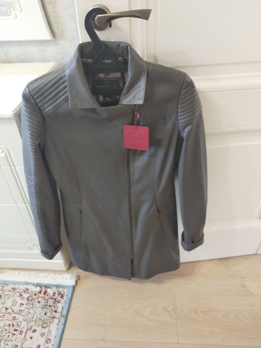 Плащь женский новый, кожанный