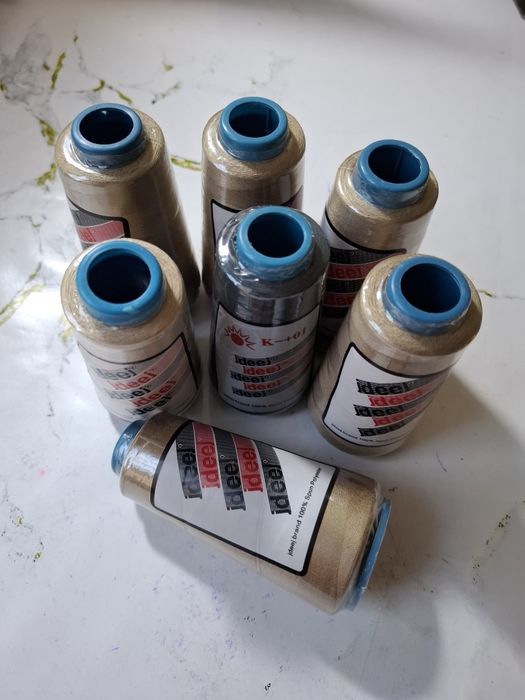 Нитки швейные машины.