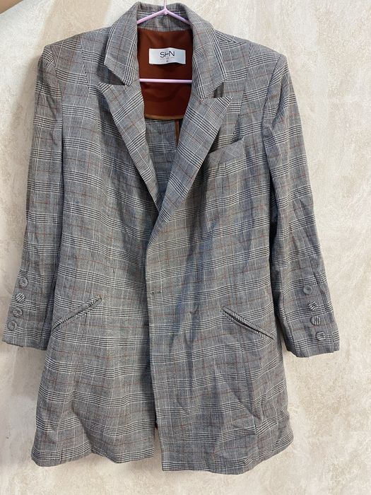 Пиджак женский в клетку серый