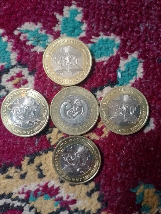 100 тенге монеты