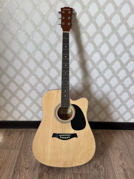 Adagio гитара сатылады. Өте жақсы қалыпта.Бағасын келісеміз.