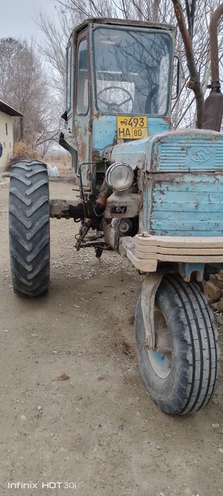 Т28 сотилади холати идеял даражада юрибтурган трактор статор аккумулят