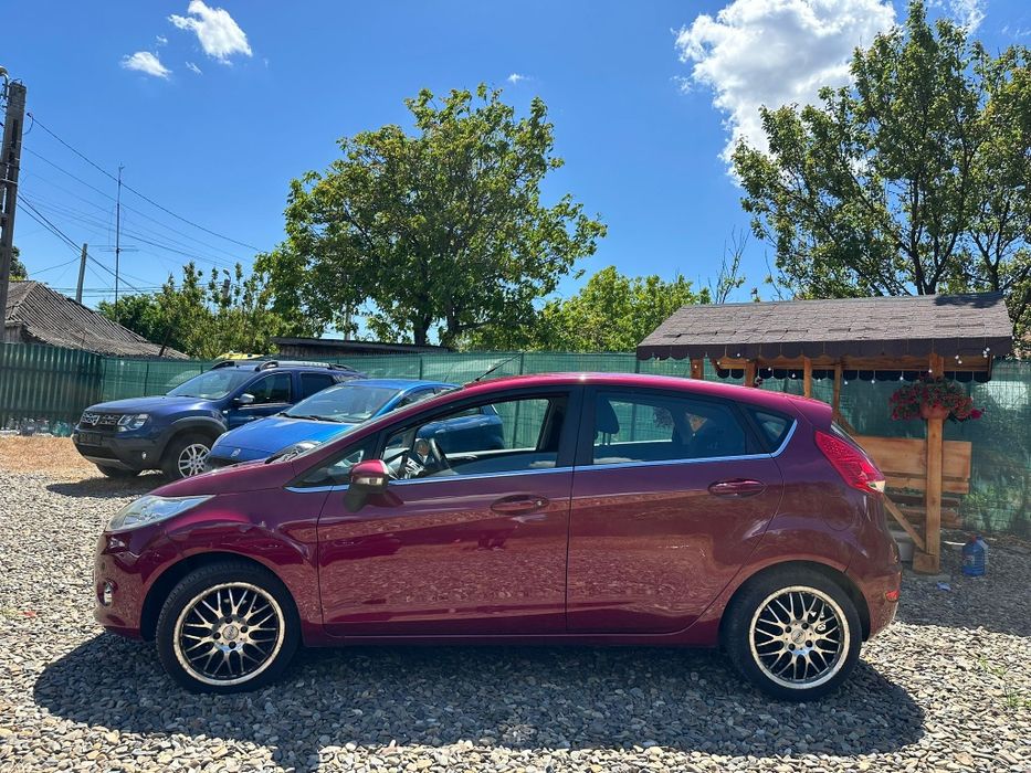Ford Fiesta Titanium an 2009 pe Acte/ 1.6tdi-90cp/Navi/Climă/Adus Recent!