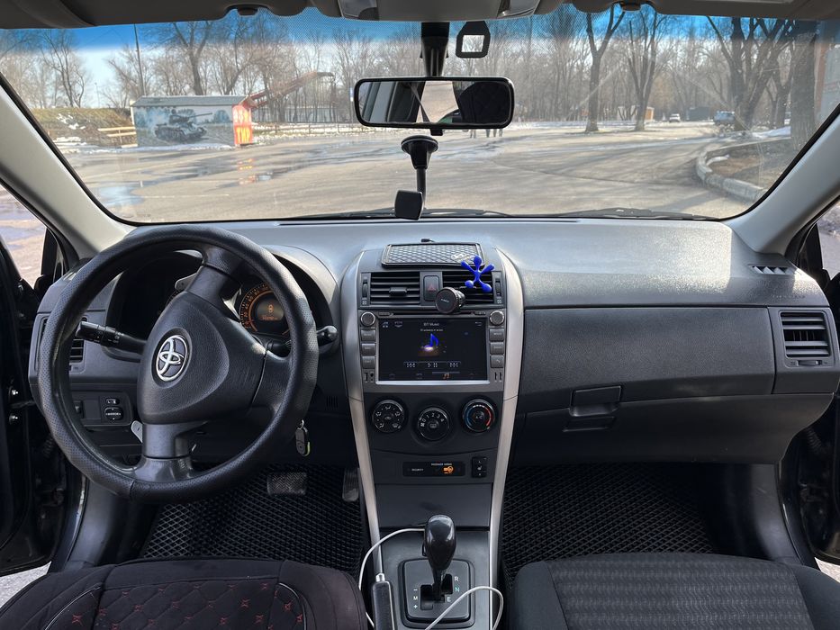 Машина Tayota Carolla