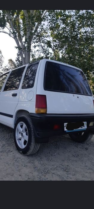 Тико сотилади. 1996 йили машин еконамични.