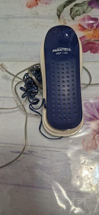 Продам телефон подвесной стационарный .