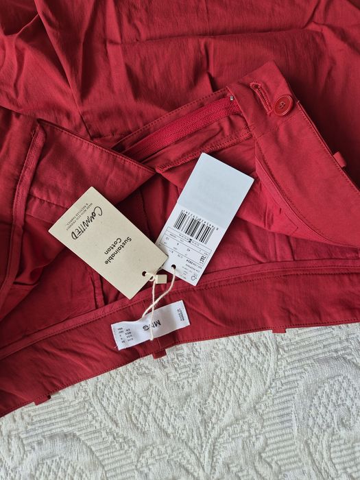 Стилен дамски сет къси панталони и елек  на Mango