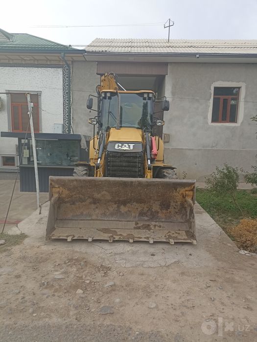 Экскаватор погрузчик