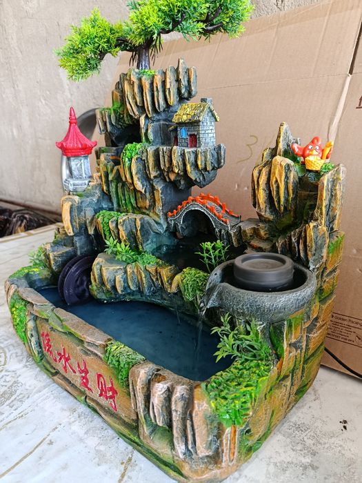 Статуэтка фонтан