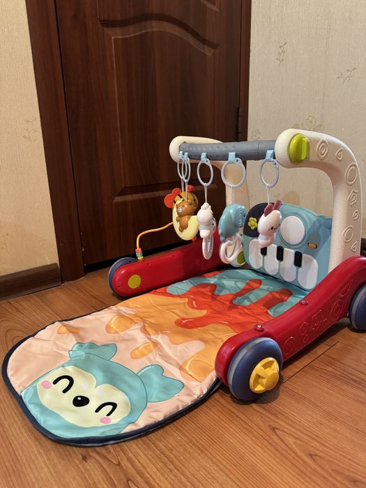 Музыкальный коврик и толокар