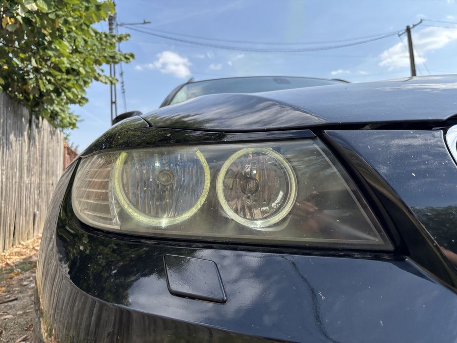 Faruri valeo complete pentru masini cu volanul pe partea stanga cu becuri halogen bmw seria 3 e90/e91 lci facelift cu angel eyes led