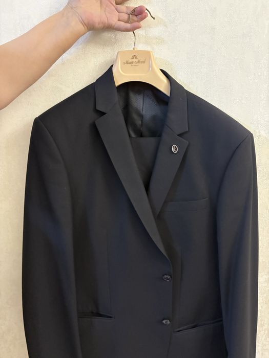 Продам костюм 56 размер