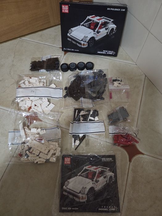 Чисто нов комплект за конструиране на модел кола Mould King 911 Pull-B