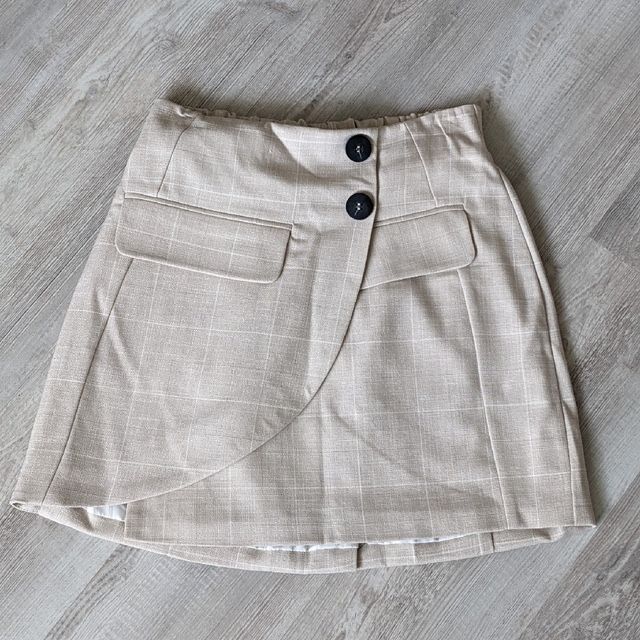 Бежевая юбка в клетку