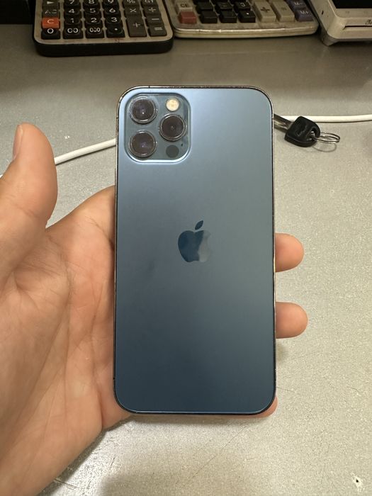 Iphone 12 pro holat idyal  arqa krshkan uzalmashkan