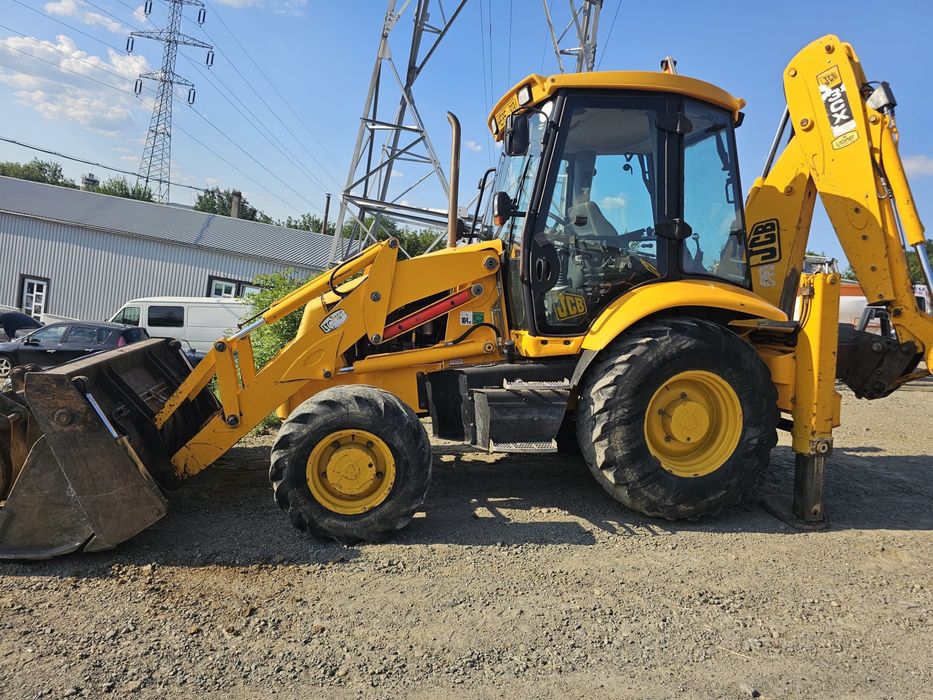 JCB 3CX Sitemaster 2003 – Cupă 4 în 1 + 4 cupe excavare