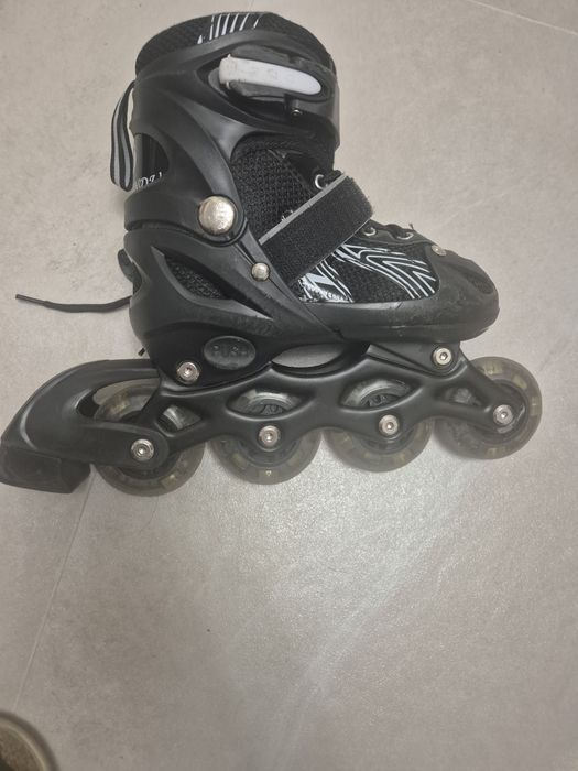 Роликовые коньки