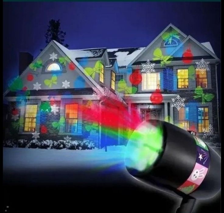 Даставка бесплатная. Новогодний лазерный проектор.