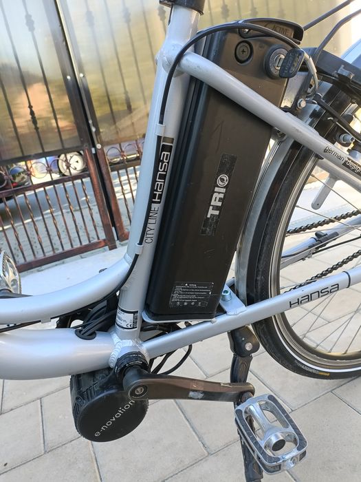 Bicicleta electrica Hansa enovation baterie 36v incarcator st 36v schimbator shimano nexus 7 viteze dinam in butuc pt persoane 150 kg,baterii 24v trio