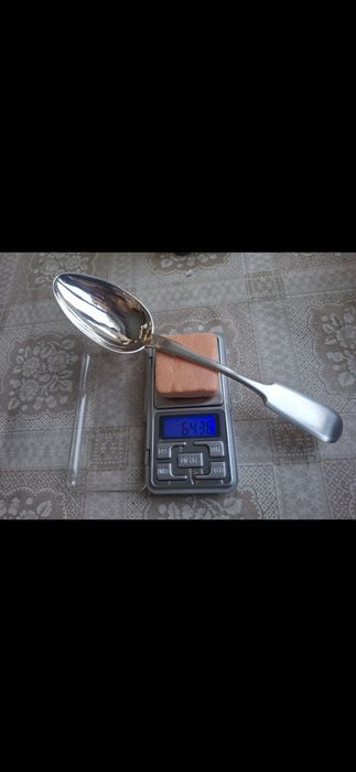 Столовая серебряная ложка.