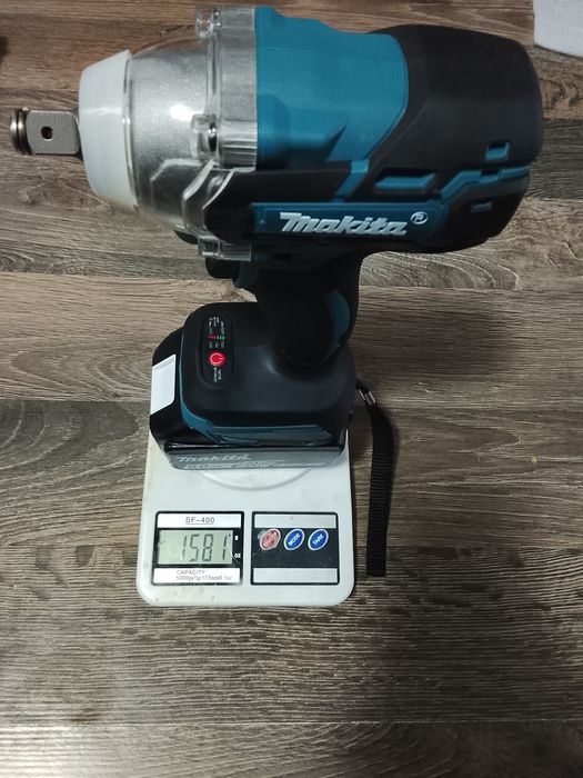 Autofiletanta impact Makita DTW285 cu baterie de 6A