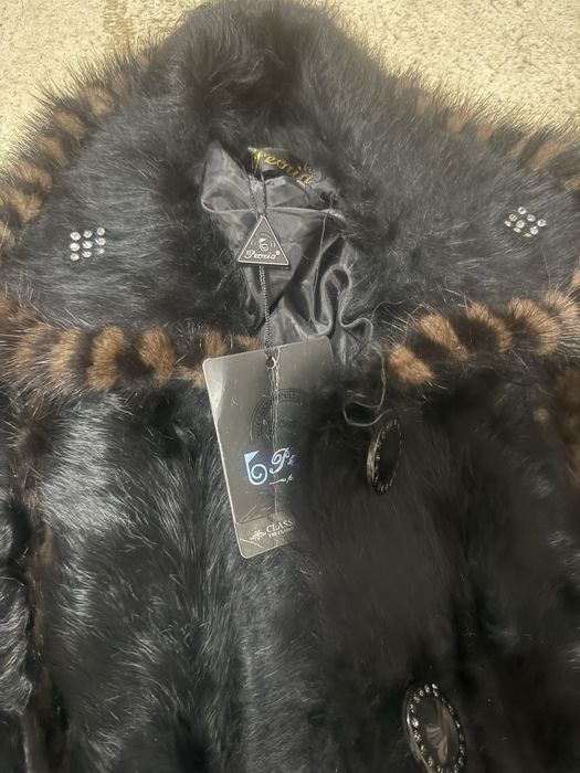 Теплая ковта новая